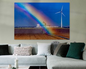 Regenboog tijdens besproeien van het boerenland van Niels Wenstedt