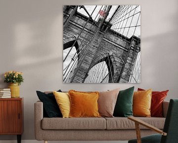 American flag on Brooklyn Bridge (black and white) by Natascha Velzel