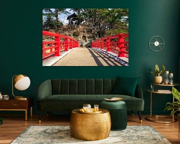 Red bridge to a Japanese island by Mickéle Godderis