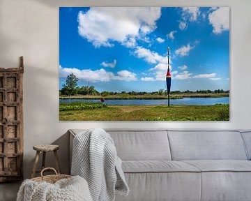 Landscape at the river Warnow with giant pose in the hanseatic city of Rostock by Rico Ködder