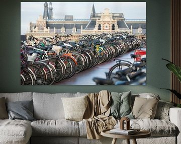 Bicycles in Amsterdam in front of the central station by Ivonne Wierink