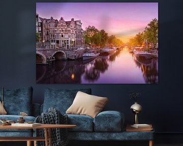 Zonsondergang bij de Amsterdamse grachten van Ruud van der Aalst