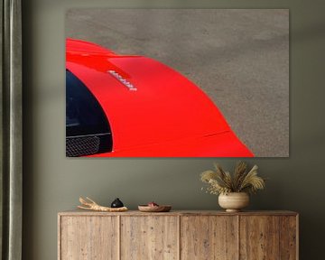 Detail on a red Ferrari F430 sports car by Sjoerd van der Wal