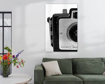 Photo d'un appareil photo rétro en noir et blanc.