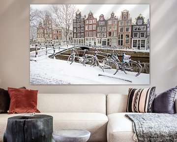 Das verschneite Amsterdam im Winter in den Niederlanden von Eye on You