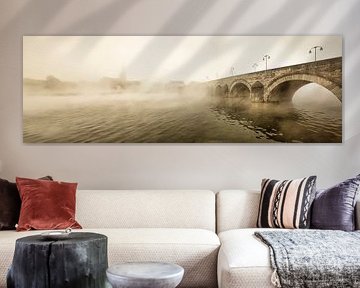 Saint Servatius bridge in Maastricht at morning fog, the Netherlands. by Frans Lemmens