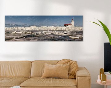 Ice shove at the lighthouse on Marken, the Netherlands. by Frans Lemmens