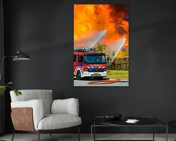 Fire engine in front of a fire in an industrial area by Sjoerd van der Wal Photography