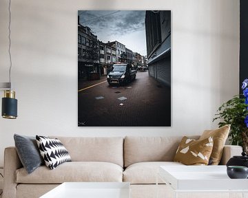 when a car drives through town by Sabine Brederode Photography