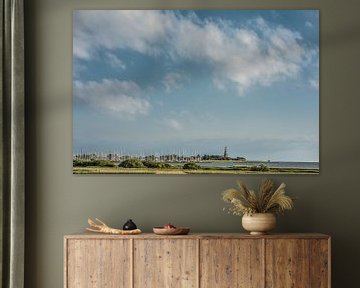 View of Hindeloopen from the IJsselmeerdijk near Workum by Harrie Muis