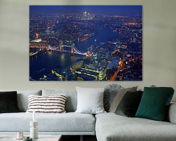 Aerial view of London with the Tower bridge on the River Thames in England at night by Eye on You