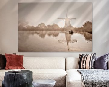 Fisherman in front of a windmill in the morning mist by Frans Lemmens
