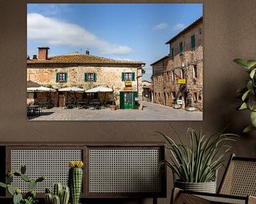 Square in a Tuscan village by Mickéle Godderis