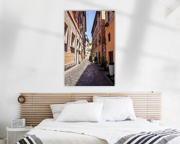 Narrow street in Rome by Mickéle Godderis