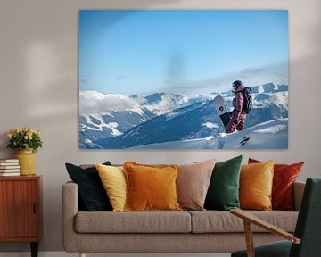 Snowboarder looking at the beautiful mountains of the Zillertal arena by Hidde Hageman