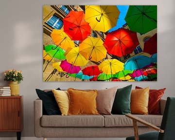 Coloured umbrellas by Ivo de Rooij