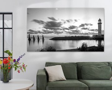 Harbour Hellevoetsluis with lighthouse in black and white by Marjolein van Middelkoop