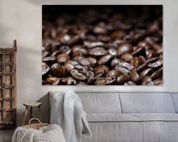 coffee backdrop, dark brown roasted beans, close up with details in the foreground, blurred in the b by Maren Winter