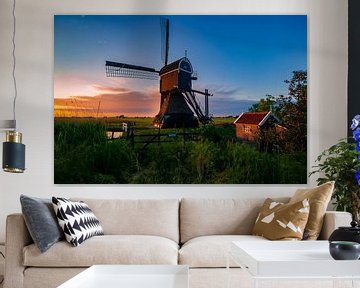 Nederlandse landschap met windmolen van Björn van den Berg