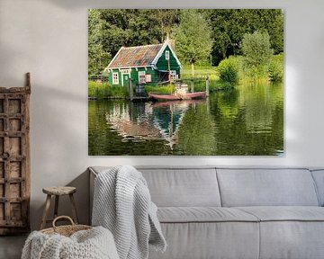 Cottage with boat by matthijs iseger