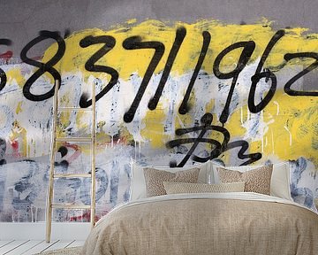 grafitti with numbers on concrete wall by Tony Vingerhoets