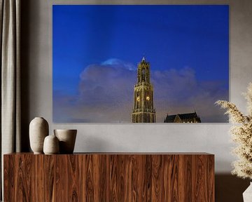 Dom tower and Dom church in Utrecht with thundercloud and starry sky