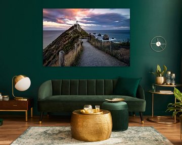 Nugget Point Lighthouse at sunset in New Zealand by Michael Bollen