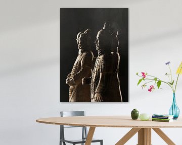 Beautiful lit Warriors from the  Terracotta army in Xi’an by Tony Vingerhoets