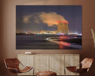 Riverbank with illuminated nuclear reactor Port of Antwerp by Tony Vingerhoets