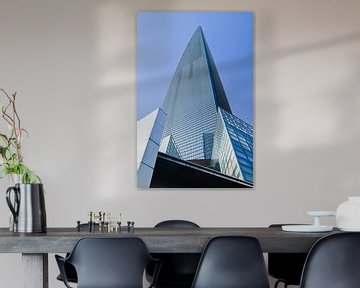 Shanghai World Financial Center against a blue sky  by Tony Vingerhoets