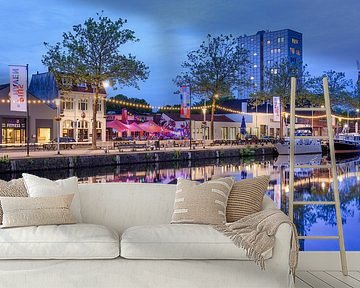 Pius harbor with yachts, cafes and terraces at twilight  by Tony Vingerhoets