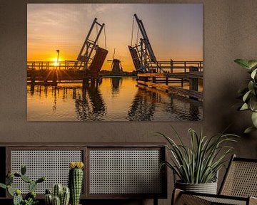 Moulins de Kinderdijk au coucher du soleil. sur Corno van den Berg