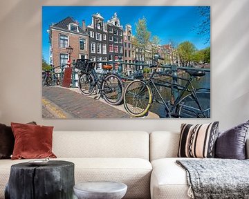 Cycling on the canals in Amsterdam by Eye on You