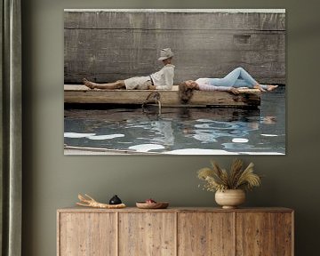 Woman and man lying on a dock, 1940 by Colourful History