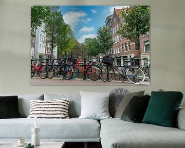 Brücke mit Radfahren Amsterdam von Ivo de Rooij