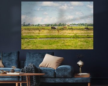 Nederland met zijn wolken en koeien van Caroline Pleysier