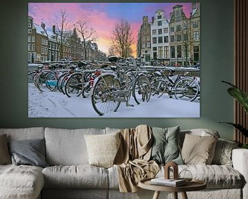 Snowy Amsterdam on the canals with sunset by Eye on You