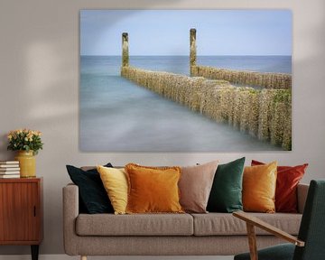 Wooden breakwater in the surf