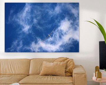 Wolken und Sportflugzeug