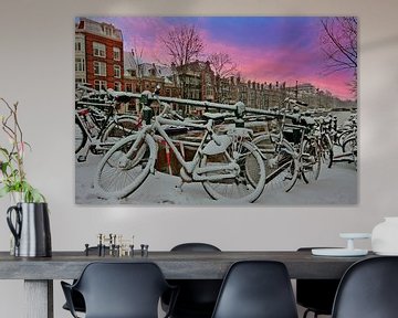 Snowy Amsterdam on the canals with sunset by Eye on You