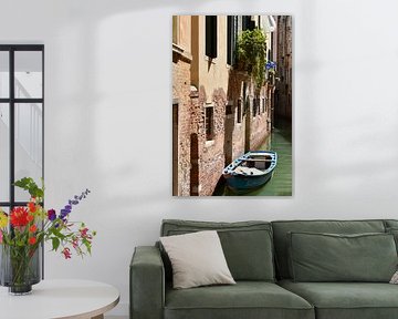 Boat in empty canal in Venice by Elise van der Bruggen