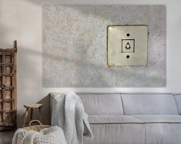 old light switch on a wall by Heiko Kueverling
