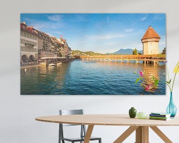 The famous Chapel Bridge and Water Tower in Lucerne, Switzerland by Chris Rinckes