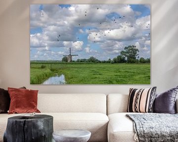 Hollands landschap met molen en wolkenlucht van Russcher Tekst & Beeld