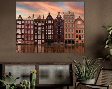 Canal houses in Amsterdam at sunrise by Roger VDB