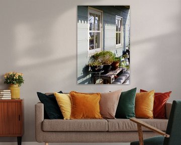 Nachmittagsglühen auf dem blauen Haus