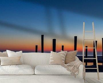 Palendorp in Petten met zonsondergang