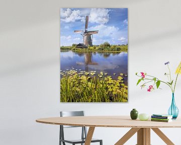 Waterway with lilies and Windmill on a summer day, Kinderdijk 2 by Tony Vingerhoets
