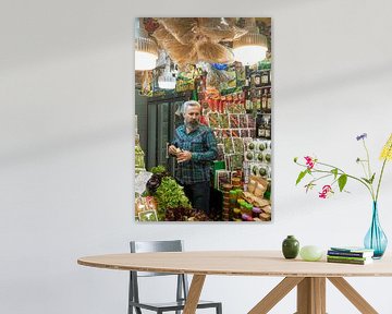 An Iranian man in his shop in Tehran