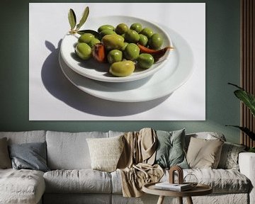 Les olives dans l'assiette sur Martijn de Ridder